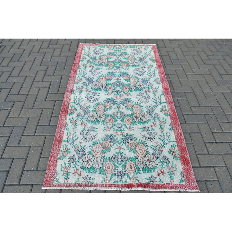 Handmade Vintage Turkish Accent Rug With Elegant Blue And Green Floral Design Framed By A Rich Red Border
