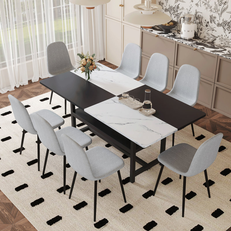 Ensemble de table et de chaises de 71 x 35,4 pouces et table de salle à manger avec fonction de rangement au milieu des pieds de la table.