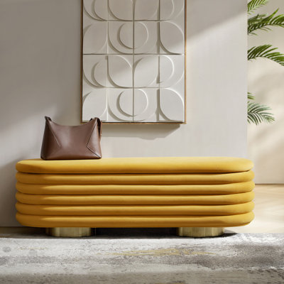 Banc de rangement rembourré en velours capitonné avec pattes en métal doré Nettie