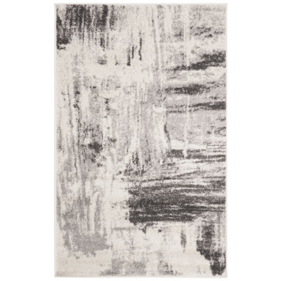 Riebe Abstract Ivory/Grey Area Rug