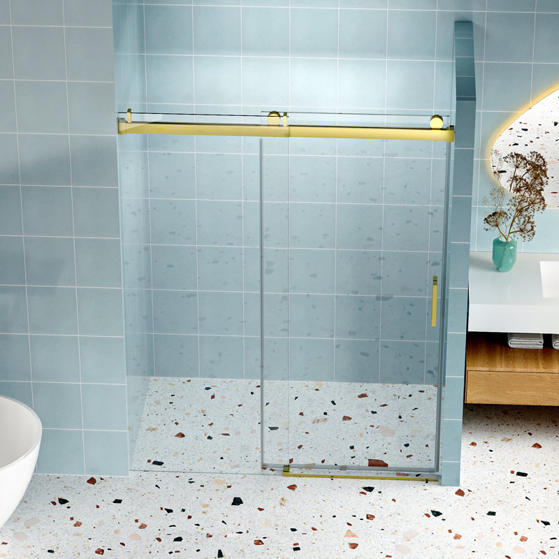 La porte de douche de 56 à 60 po x 76 po, dorée, en verre trempé de 1/4 po, offre des options d'installation polyvalentes avec un système réversible qui maintient l'apparence impeccable des bords polis