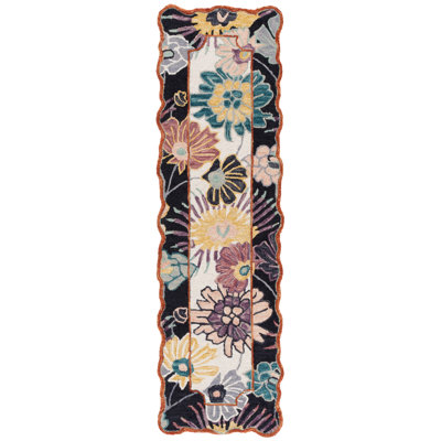 Jaiprkesh Hand Tufted Wool/Cotton Floral Rug in Black/Ivory