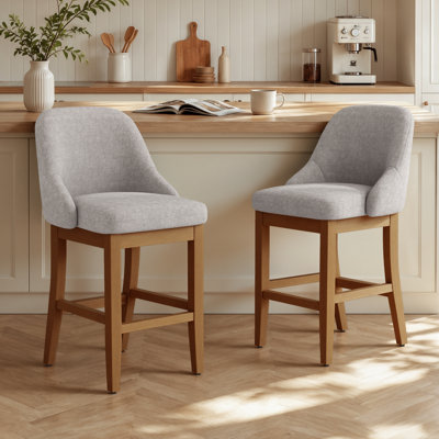 Tabouret de bar moderne à hauteur de comptoir avec dossier, siège en similicuir et pieds en noyer d'hévéa