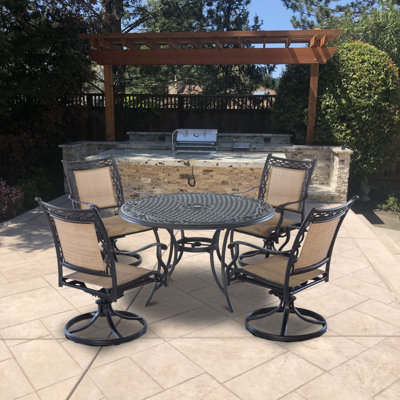 Kamas 4 - Person Patio Dining Set with Round Table