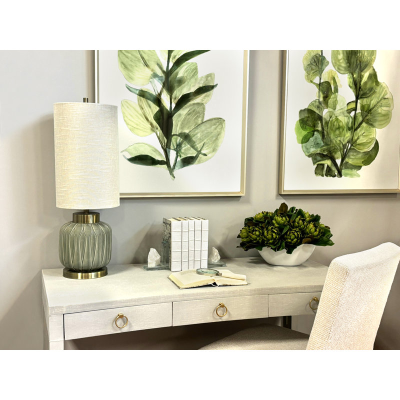 Magnolia and Artichoke Floral Arrangements in a Fiberstone Pot