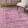 Tapis rose à motif géométrique Dietz