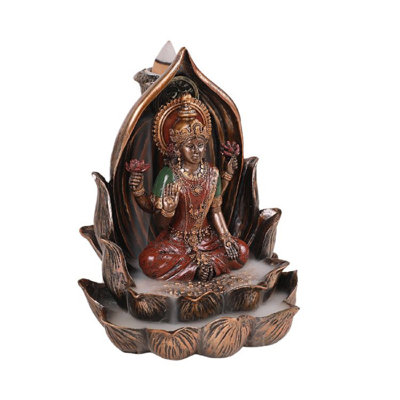 Johnny elayanti déesse lakshmi assis sur un figurine de fleurs lotus Sholes