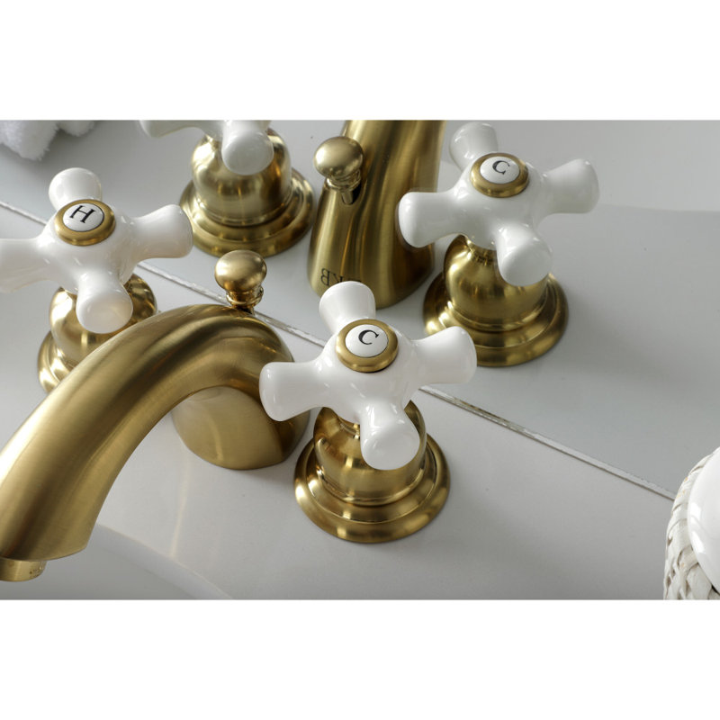 Kingston Brass Victorian Two-Handle 3-Hole Deck Mount Mini-Widespread Bathroom Faucet with Plastic Pop-Up, Brushed Brass