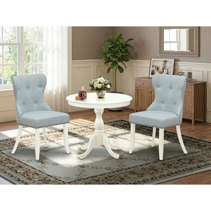 L'ensemble de table de salle à manger 3 pièces se compose de 1 table à piédestal et de 2 chaises de salle à manger en tissu de lin bleu capitonné à dossier capitonné avec têtes de clous - finition lin blanc