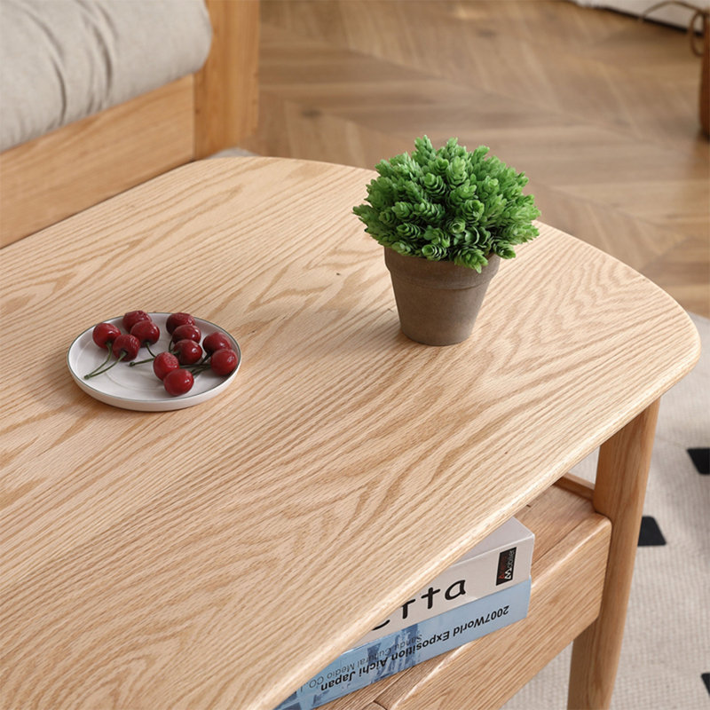 Modern simple oval solid wood coffee table, 23.6" H x 39.4" L x 23.6" D