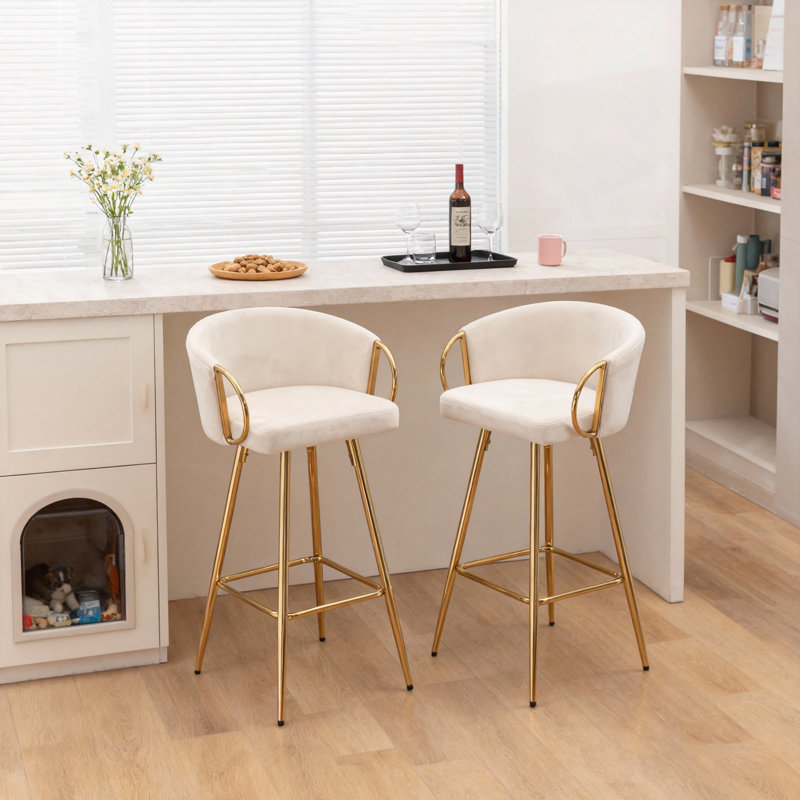 Ensemble de 2 tabourets de bar avec repose-pieds chromé et pieds dorés