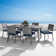 Ehrenfried Rectangular 6 - Person 78'' Long Wicker Dining Set with Sunbrella Cushions