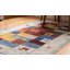 Tapis beige en laine noué à la main à motif géométrique traditionnel