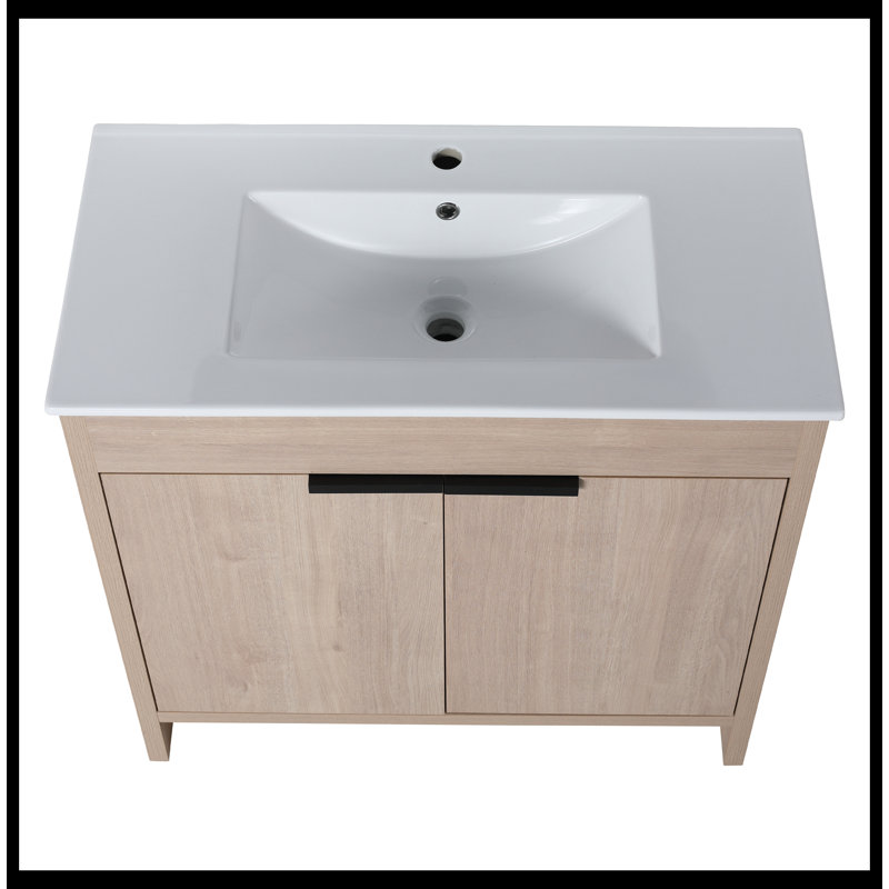 Meuble-lavabo autoportant avec lavabo en céramique blanche et 2 portes d'armoire à fermeture en douceur