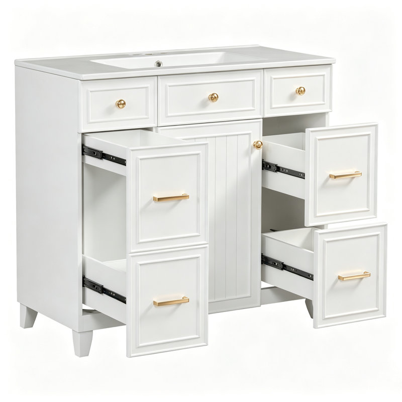 Meuble-lavabo blanc de 91 cm (36 po) avec lavabo en céramique, structure en bois massif, portes à fermeture amortie, étagères réglables et 3 tiroirs, dont un tiroir de rangement double profondeur pour sèche-cheveux.