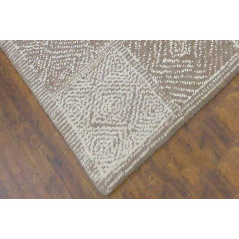 Tapis ivoire en laine touffeté à la main Absolon