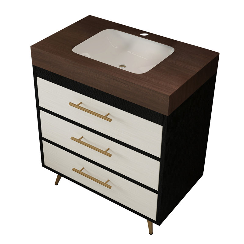 Meuble-lavabo Mid-Century moderne avec lavabo en céramique et plateau en pierre frittée. Il comporte un tiroir inclinable à fermeture en douceur pour un rangement efficace. Les pieds en acier thermolaqué ajoutent de la stabilité
