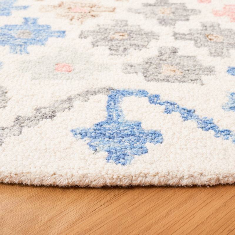 Lukats Hand Tufted Wool/Cotton/Latex Geometric Rug in Blue/Red, Round 6'