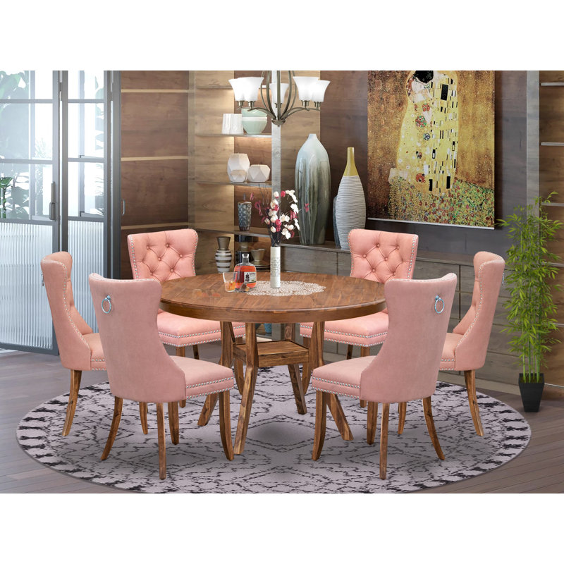 L'ensemble de table de salle à manger 7 pièces comprend une table ronde avec piédestal et 6 chaises rembourrées en tissu bleu marine en polyester, noir sablé
