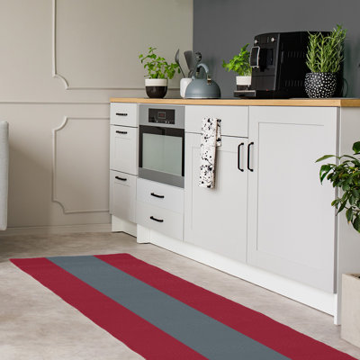 Tapis rouge/gris