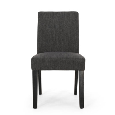 Chaise de salle à manger gris anthracite chic avec un revêtement lisse et pénétrant et des pieds fuselés équilibrés