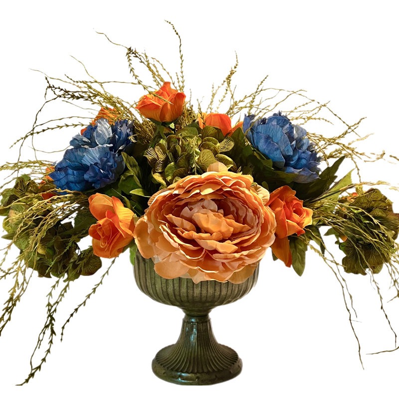 Arrangement de pivoines et d'hortensias dans un vase