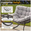 Fauteuil à bascule gris clair avec repose-pieds, fauteuil en osier résistant aux intempéries et coussins