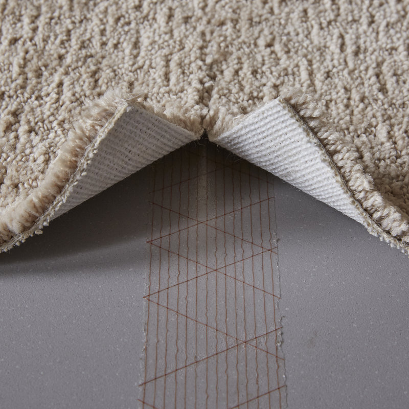Ruban adhésif pour tapis Huseby
