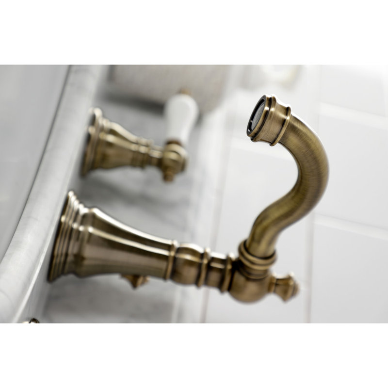 Kingston Brass American Patriot Two-Handle 3-Hole Deck Mount Widespread Bathroom Faucet with Pop-Up Drain, Antique Brass
