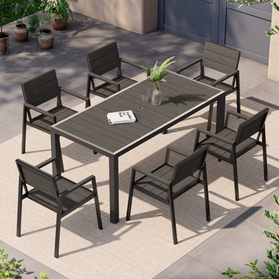 Ensemble de salle à manger d'extérieur en aluminium pour 4 personnes avec plateau en bois et chaises de salle à manger