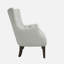 Fauteuil à oreilles capitonné