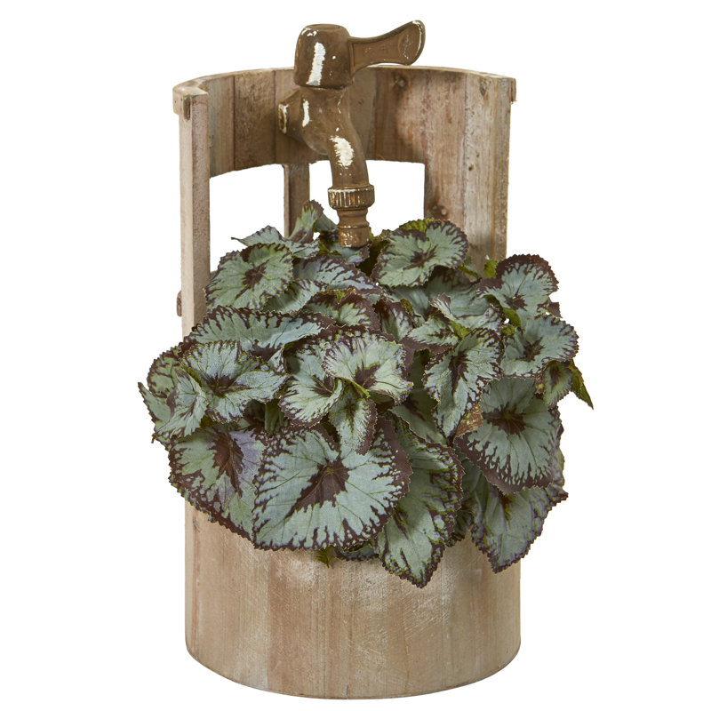 Plante begonia artificielle en pot de fleurs