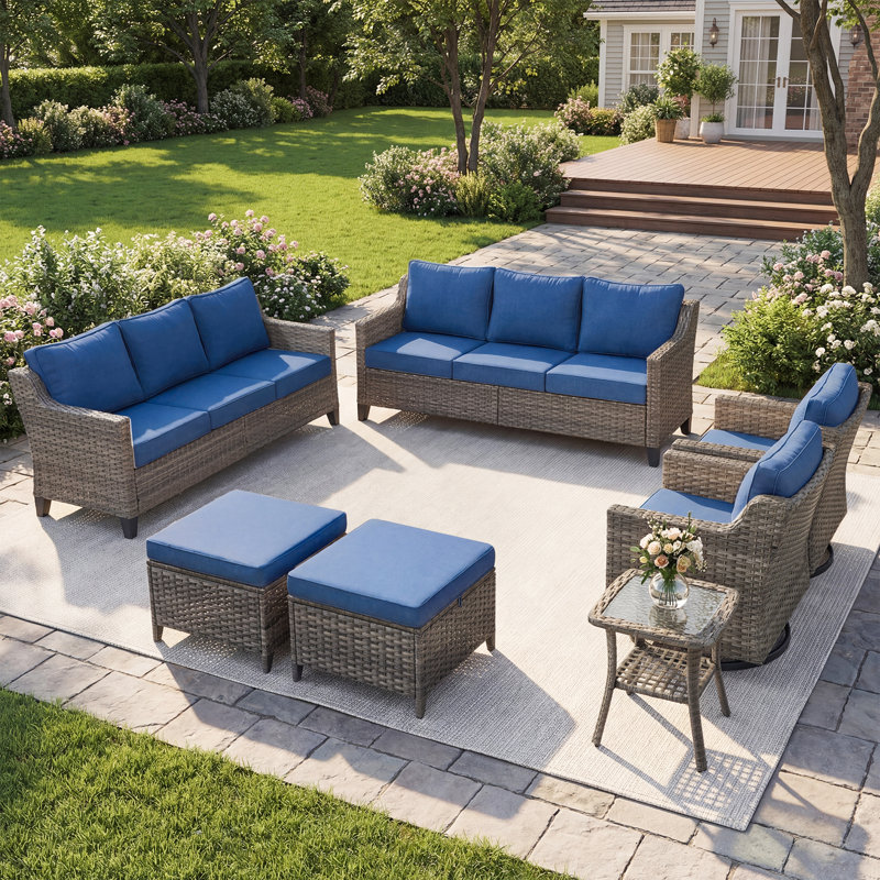 Arlene 7-Piece Outdoor Wicker Patio Conversation Set With Swivel Chairs, Ottomans And Side Table, Blue