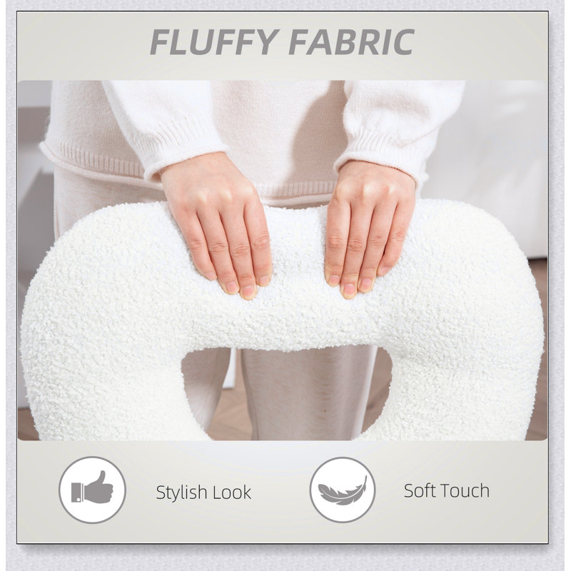 Fauteuil de bureau élégant avec dossier en forme de cœur, roulettes pivotantes et revêtement en molleton peluche pour un confort et un style incomparables.