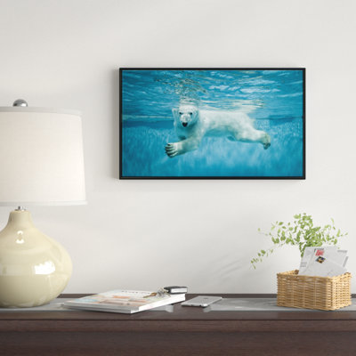 «Ours polaire nageant sous l'eau», reproduction de photo sur toile tendue encadrée