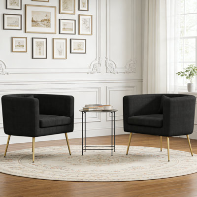Fauteuil demi-tonneau rembourré en velours avec pieds en métal