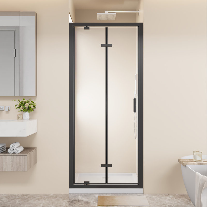 Porte de douche pivotante pliante avec cadre 32 po x 72 po peu encombrante, verre trempé transparent de 1/4 po avec poignée en acier inoxydable, installation réversible, noir