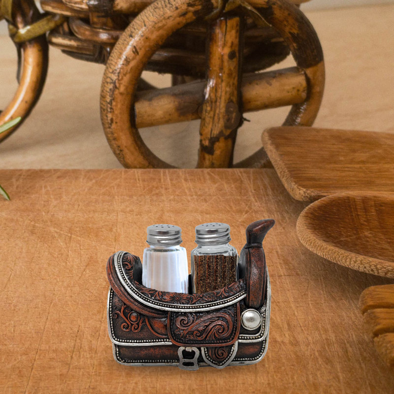 Ensemble de porte-salière et poivrière en cuir travaillé