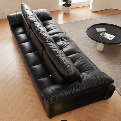 Canapé modulaire noir en similicuir