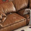 Causeuse-coussin modulaire en similicuir brun
