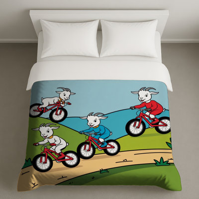 Chèvres chevauchant des housses de couette