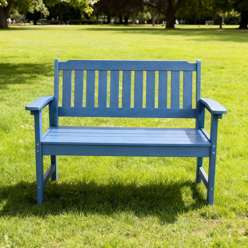 Banc bleu foncé avec structure stable et ergonomique pour les décors extérieurs