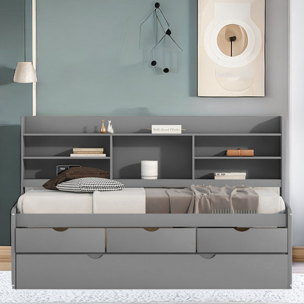 https://assets.wfcdn.com/im/67354618/resize-h600-w600%5Ecompr-r85/2569/256957368/Bealeton+Twin+Size+Daybed+with+Trundle%2C+Bookshelves+and+Three+Storage+Drawers.jpg