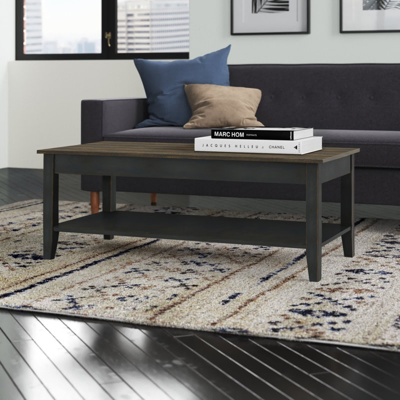 Lorraine Manufactured Wood Coffee Table with Storage Shelf , Dark Distressed Black