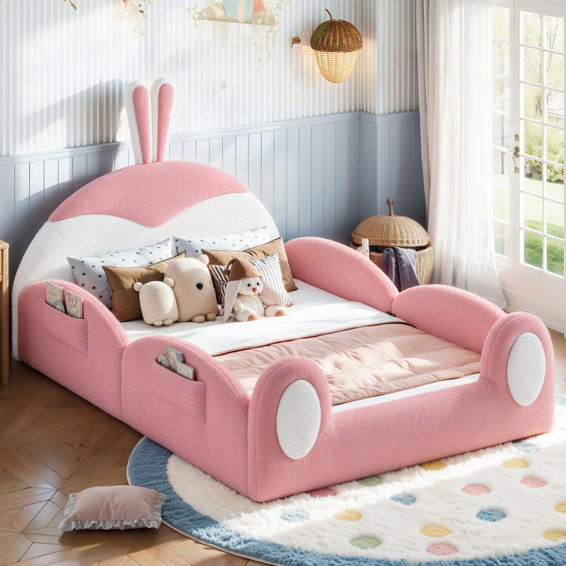 Lit de sol rembourré Hoppity pour enfants avec tête de lit lapin, cadre de lit pour tout-petits avec poches de rangement latérales