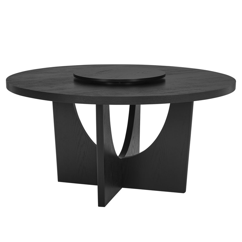 Table ronde moderne avec plateau tournant, offrant une élégance intemporelle et pratique pour la salle à manger.