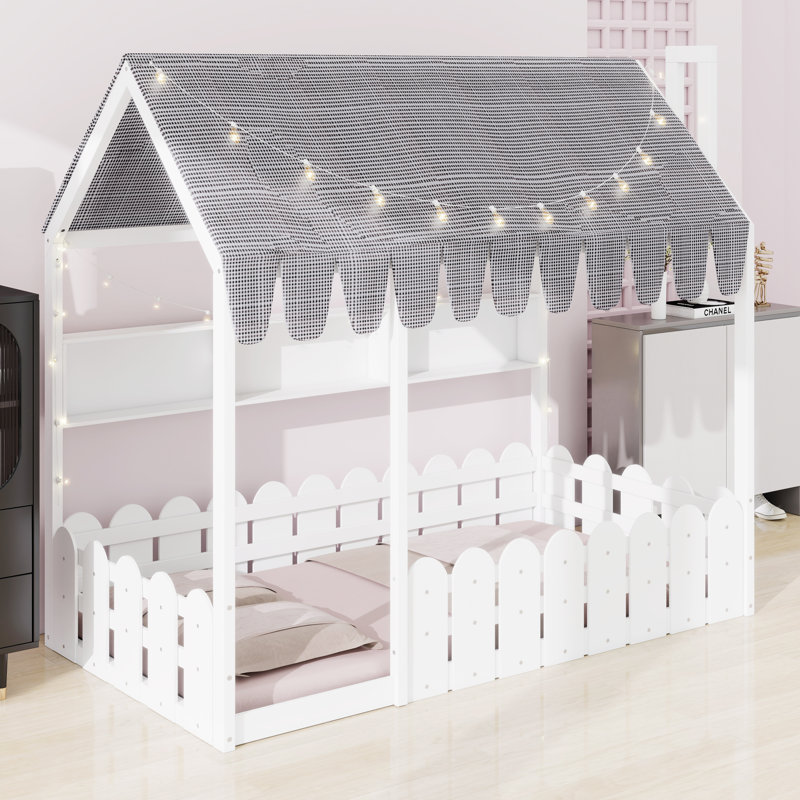 Lit de plancher pour enfant équipé d'une clôture de sécurité, d'une tente de jeu, de lumières décoratives et de compartiments de rangement