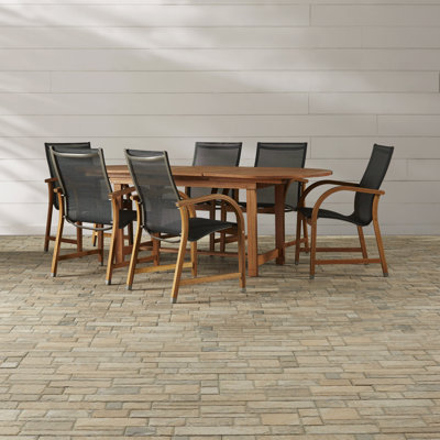 Anautica 6 - Person Eucalyptus Solid Wood Patio Dining Set Extendable and Umbrella Hole Included Oval Table