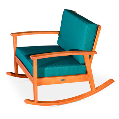 Chaise berçante en eucalyptus avec coussins foncés, finition huilée naturelle, rehausse le bonheur extérieur de la terrasse