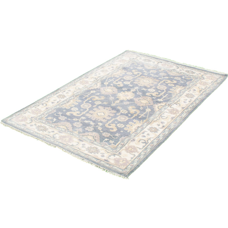 Tapis décoratif en laine de conception unique noué à la main bleu clair/crème 5 pi x 7 pi 8 po Brünhild